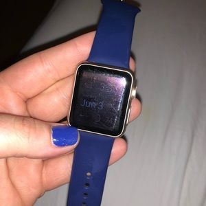Series 1 42 mm Apple Watch. Gold with navy band